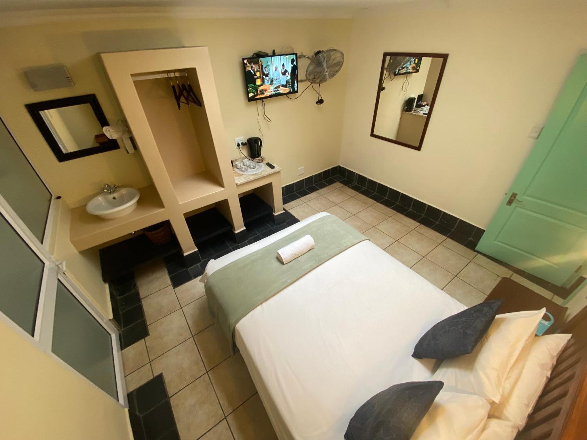 Green Door Guesthouse モーセル・ベイ 部屋 写真